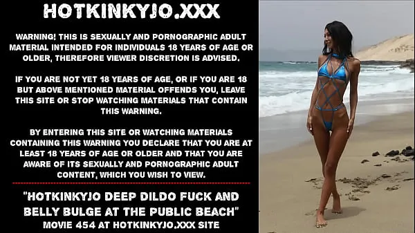 Hot HKJ bellybulge on the beach köra filmer